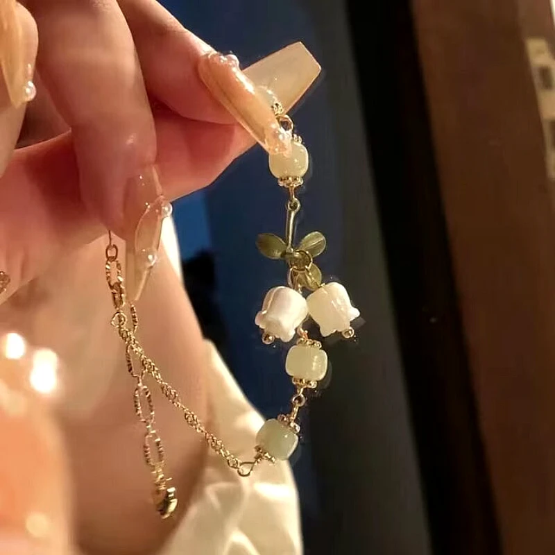 Delicate White Flower & Butterfly Charm Beaded Cha - Product Image