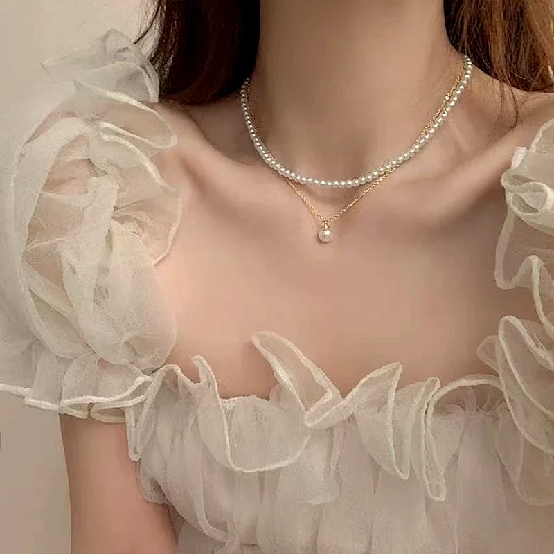 layered-pearl-pendant-necklace_1320_ctk9.webp