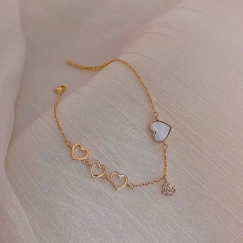 rose-gold-tone-multi-heart-charm-ch_1320_hito.webp